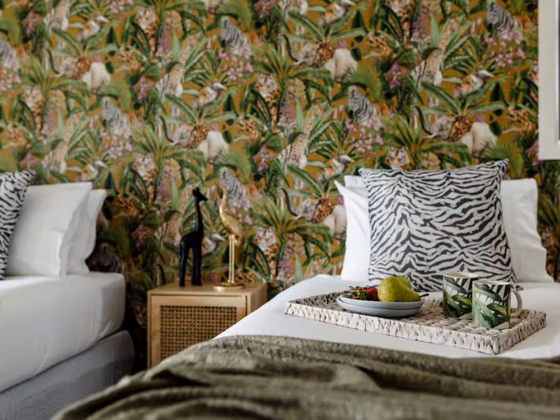 Comfortable bedroom with feature wall design