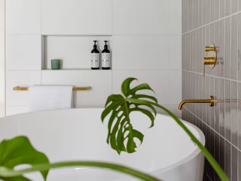 Relax and unwind in the elegant bathtub after a day of exploring.