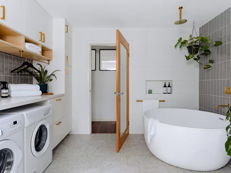 Functional laundry and bathroom amenities for convenience