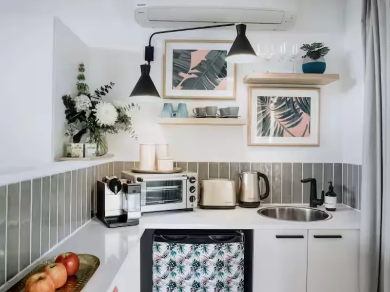 Brewing coffee with a view of leafy greens