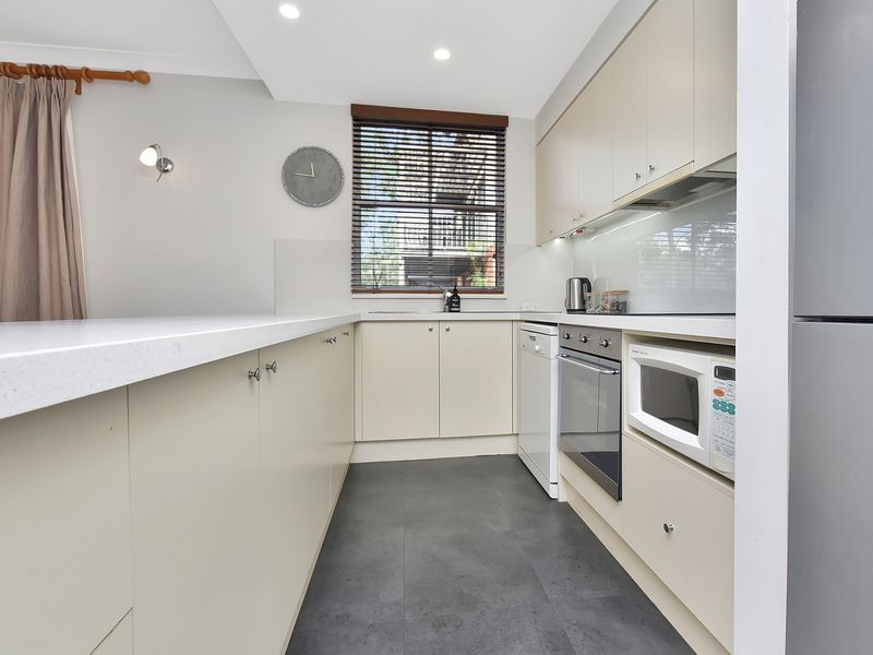 Bright, fully equipped kitchen with generous bench space