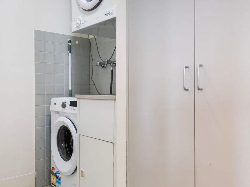 Internal laundry with washing machine, dryer and storage, perfect for extended stays