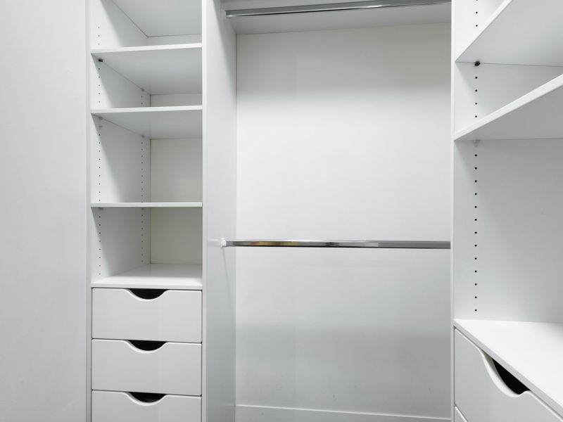 Walk in wardrobe with generous storage, perfect for longer stays or added convenience