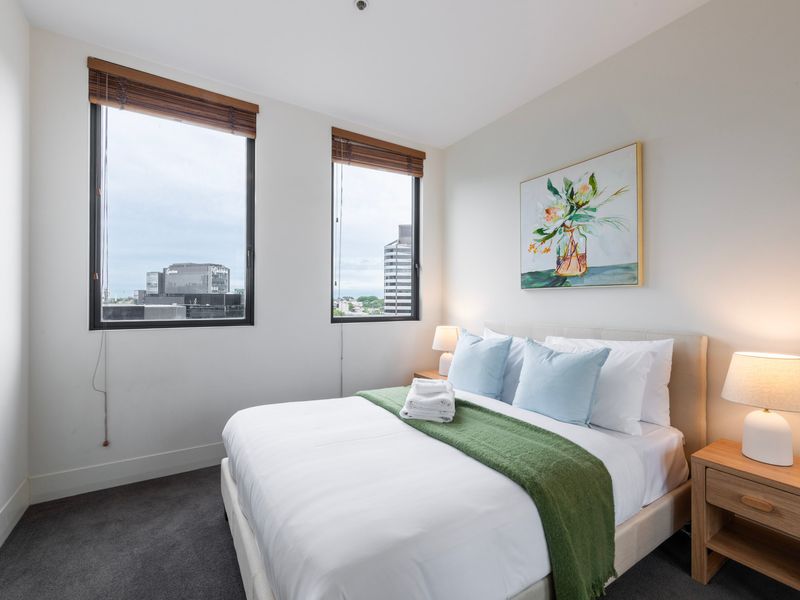 Bedroom with a double bed, soft styling and natural light creating a relaxing retreat