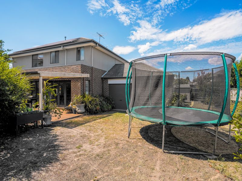 Spacious garden with trampoline