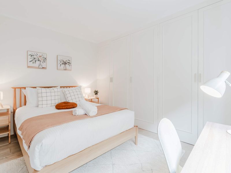 Bedroom 1 with Desk and Queen Bed 