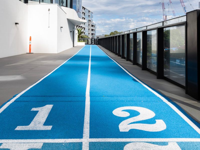 Rooftop communal running track with elevated views