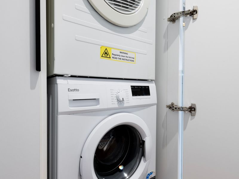 Internal laundry with washer and dryer for guest convenience