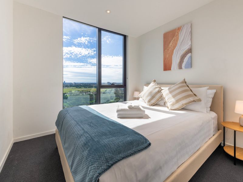 Spacious master bedroom with queen bed and quality linen