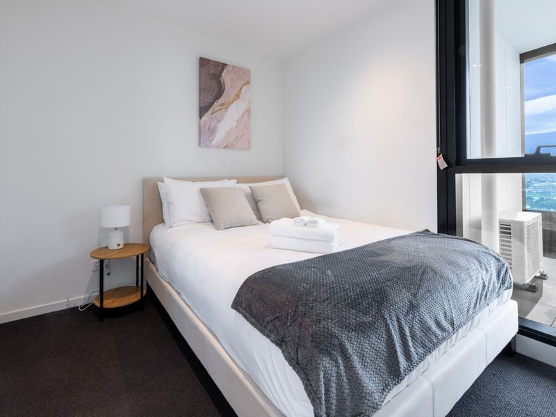 Second bedroom with queen bed and built-in comfort