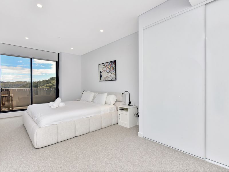 Light-filled bedroom with built-in wardrobe.