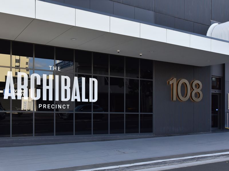 The Archibald – premium apartment complex entrance.