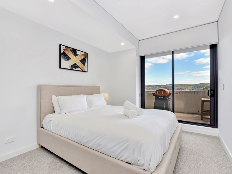 Comfortable bedroom with picturesque outlook.