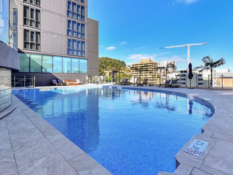 Resort-style outdoor swimming pool.