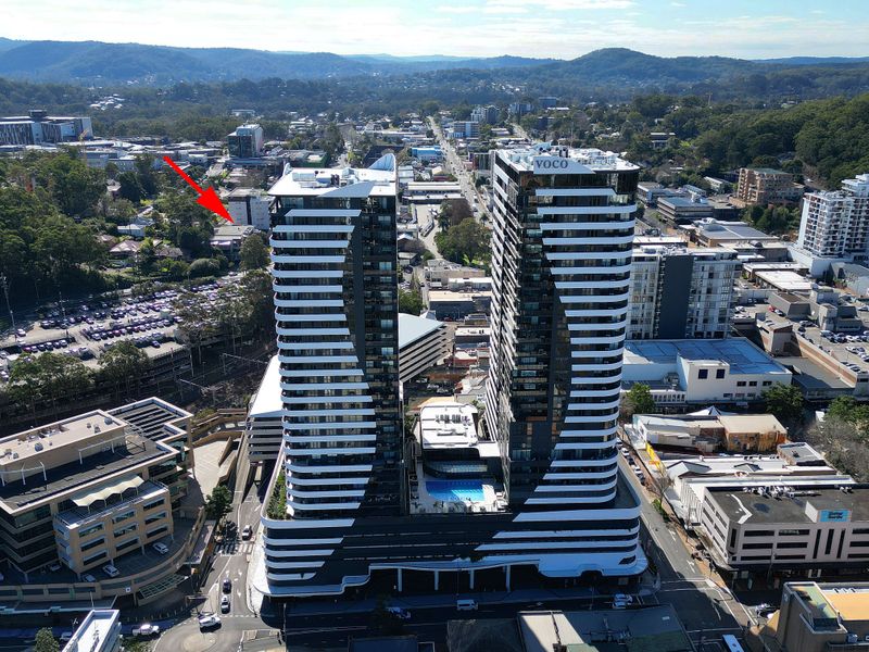 Aerial view highlighting the apartment's central location.
