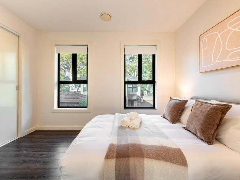 Cosy Double bedroom styled with warm tones and comfortable bedding for a restful stay.
