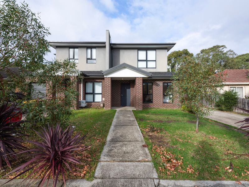 Contemporary home with a welcoming entrance in a residential setting.