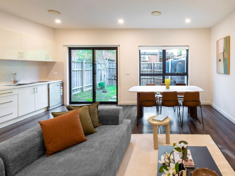 Bright and inviting living space overlooking the outdoor area.