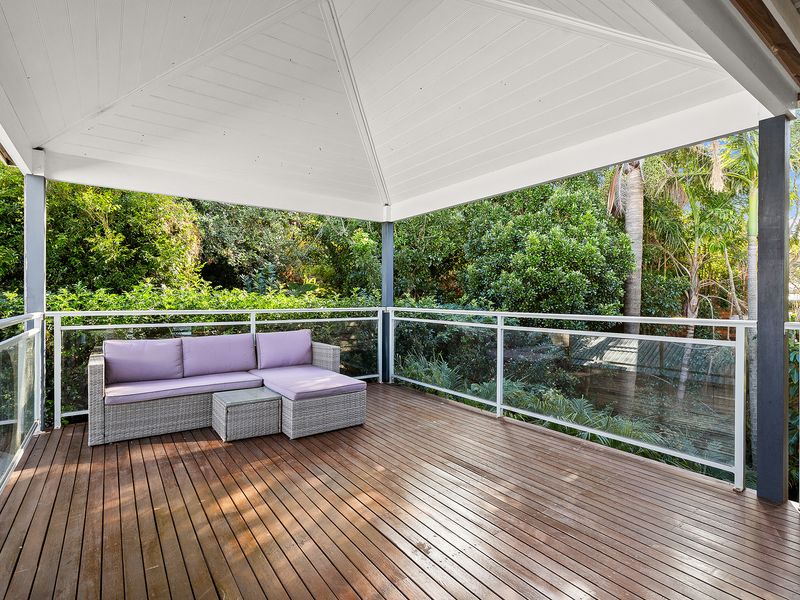 Wide-open terrace living with lush plants and trees as your backdrop.