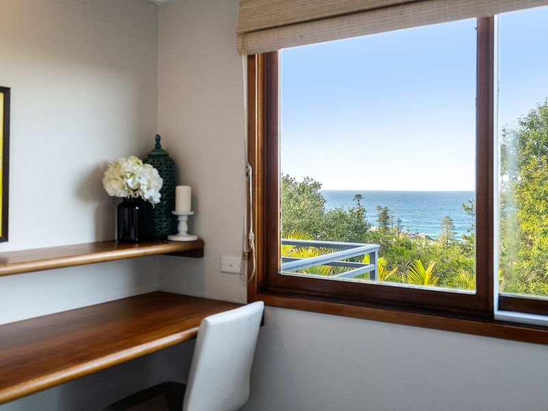 Ocean views and natural light create the perfect work-from-home setup.
