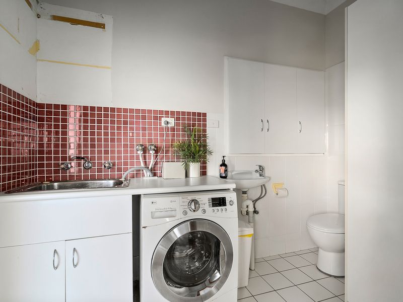 A clean and functional laundry space designed for everyday convenience.
