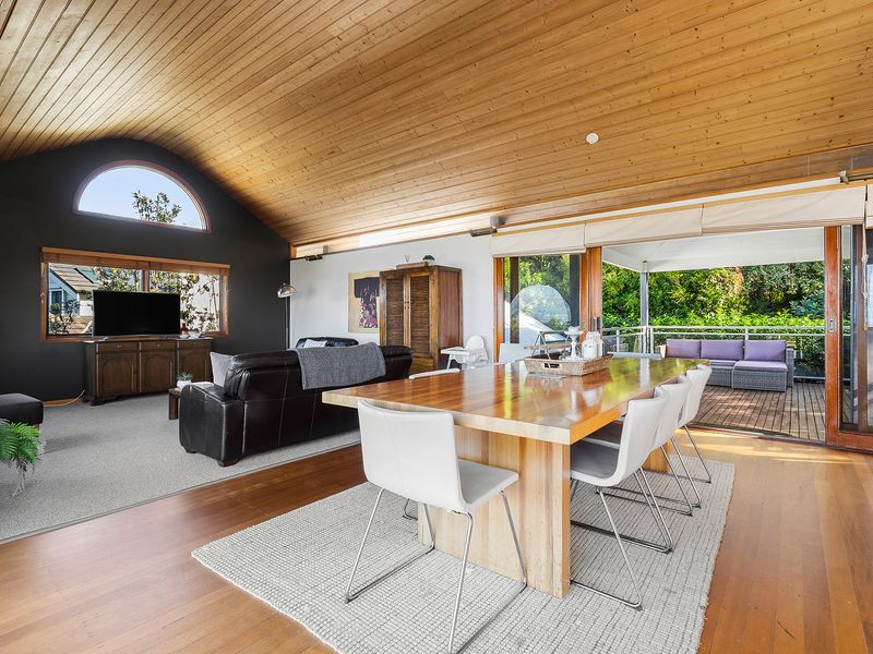 Open-plan living where dining, comfort, and outdoor terrace living come together.