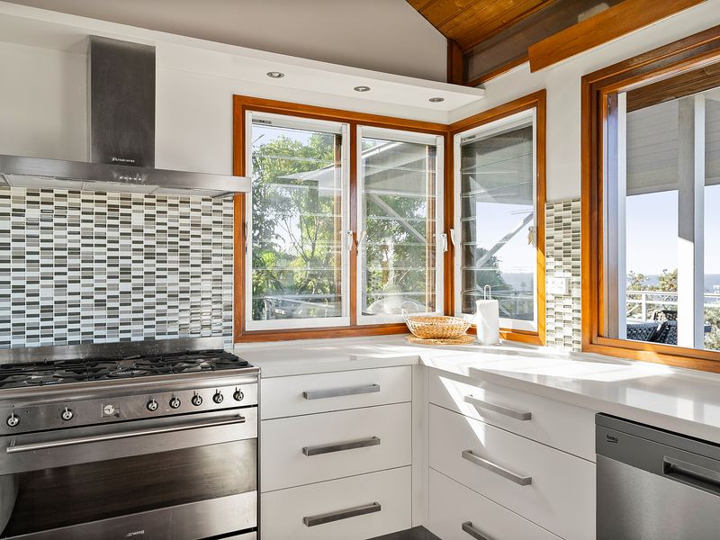Clean, spacious kitchen made for shared moments and great meals.