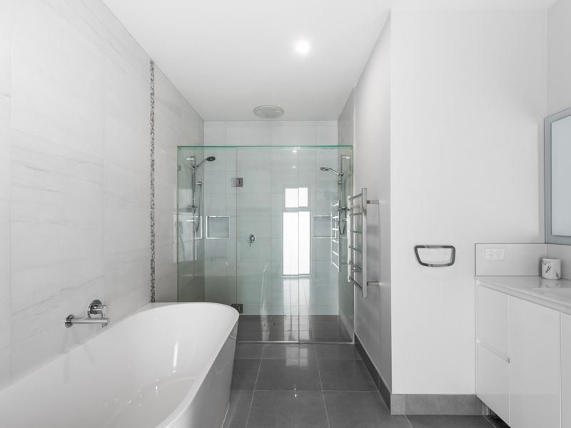 Modern ensuite bathroom with walk-in shower and sleek finishes