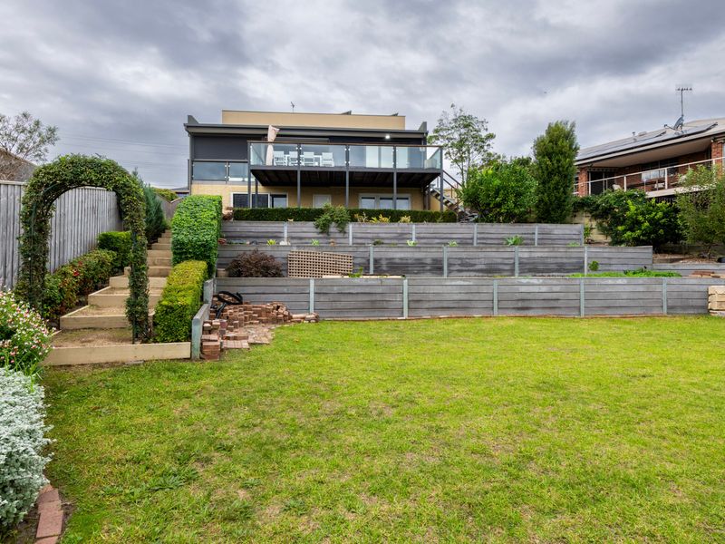 Private backyard with plenty of room for entertaining or kids.
