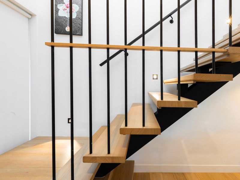Internal staircase connecting levels of the home with ease and flow throughout the space
