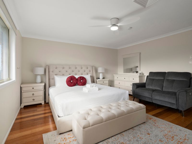 A versatile sitting area within the bedroom creates an extra space to read or recharge.