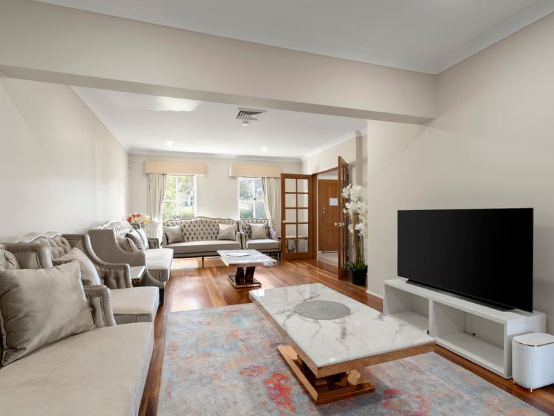 Another spacious living area offers plenty of room for families and groups to spread out comfortably.