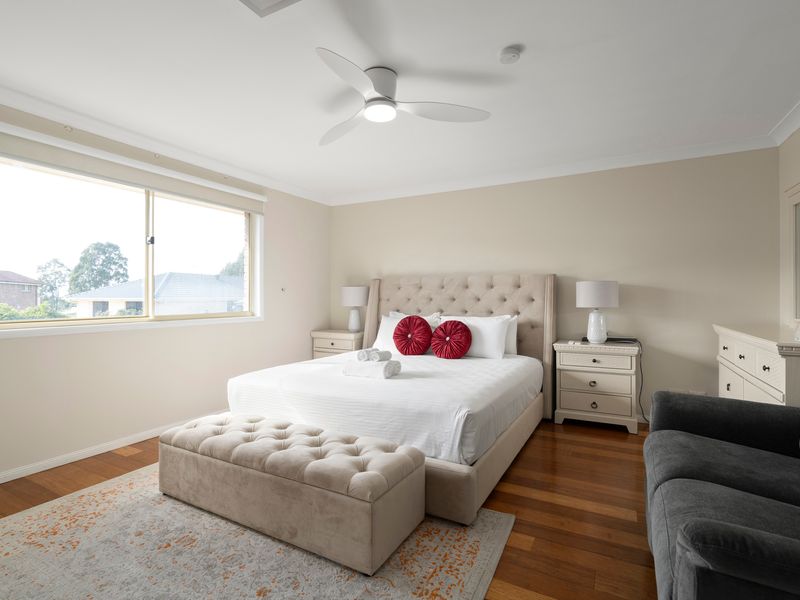 The generously sized master suite provides a peaceful retreat with ample space to relax.