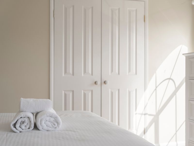 Built-in wardrobes provide excellent storage for longer stays.