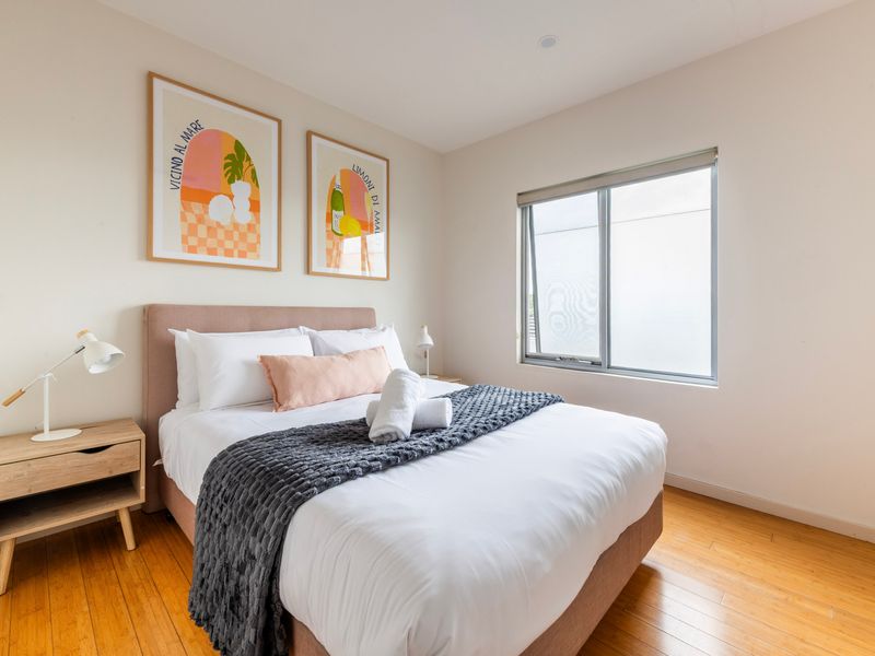 Comfortable queen bedroom with a calm and inviting feel