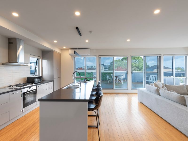 Kitchen Island and open floor living with patio access
