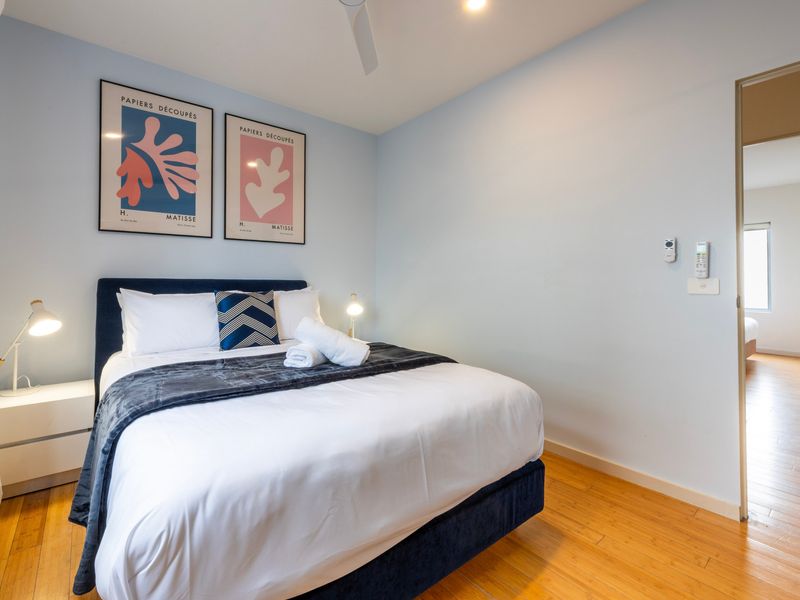 Bright queen bedroom perfect for families, friends, or longer stays.