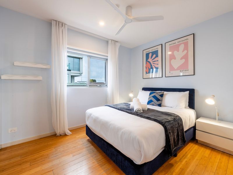 Bright queen bedroom perfect for families, friends, or longer stays.