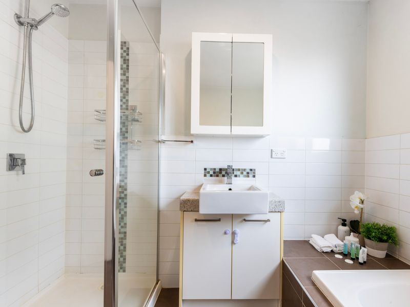 Main bathroom offering added convenience for groups and families.