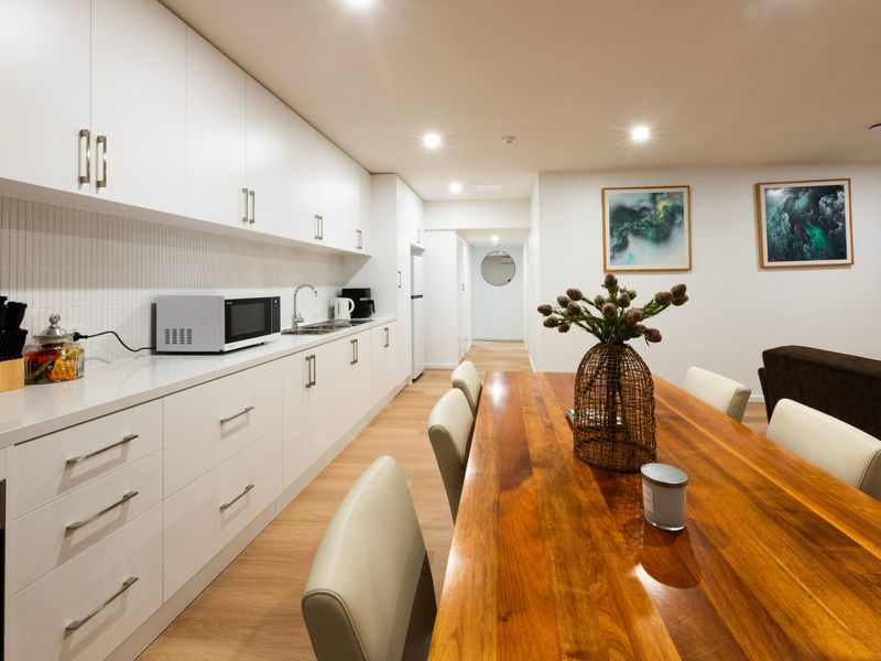 Dedicated dining area suitable for meals, takeaway, or working from home.
