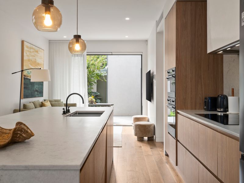 ully equipped modern kitchen with quality appliances and ample bench space