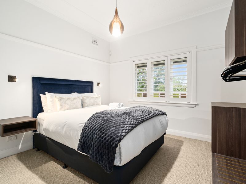 Boutique-style bedrooms with soft calming tones