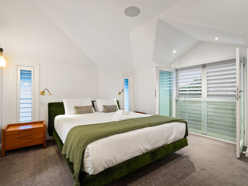 King ensuite with serene styling