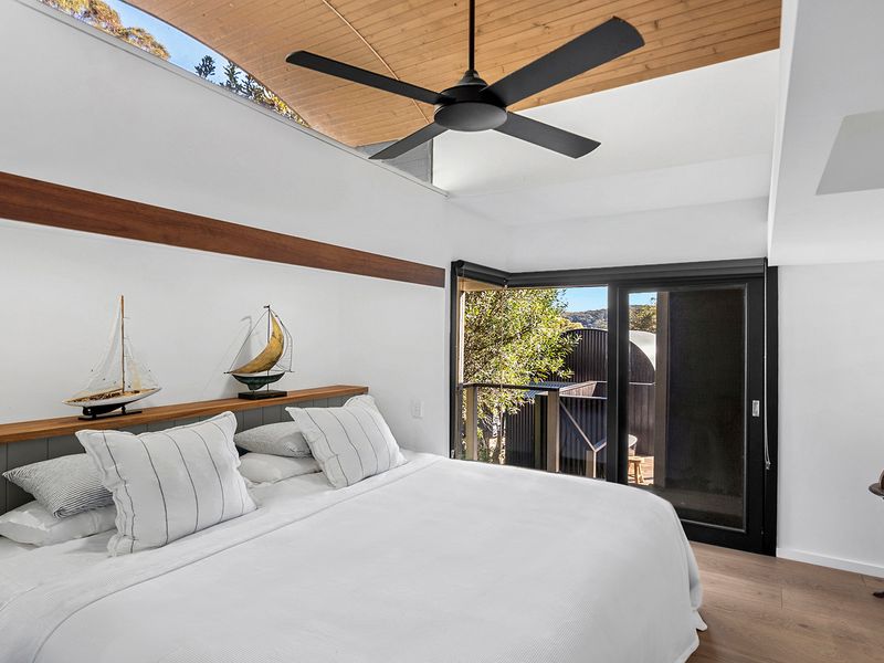 Comfortable King bed above the coastline