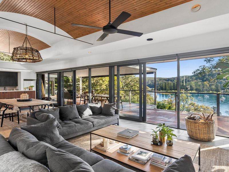 Sink into comfort with water views beyond
