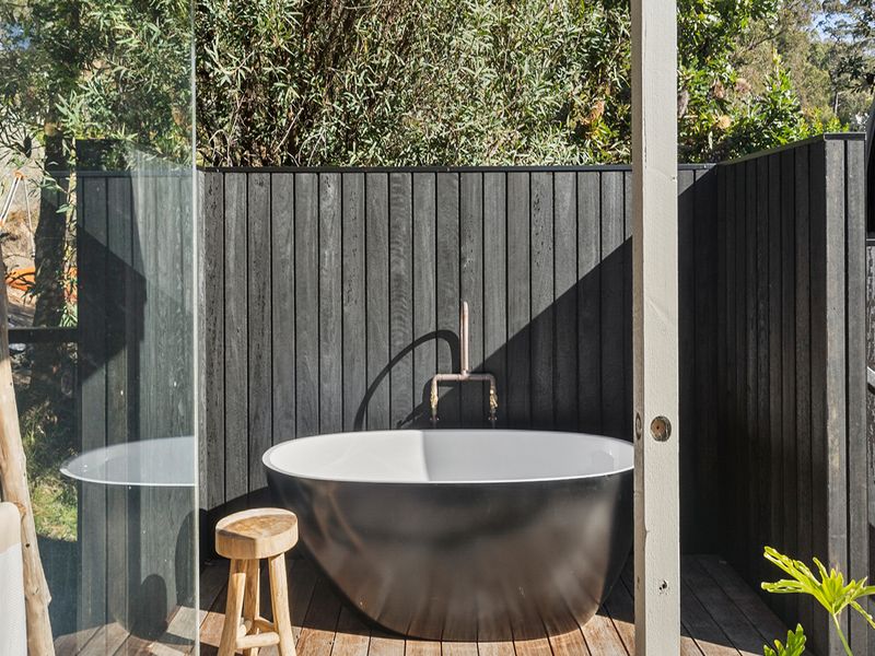 Soak outdoors beneath the trees