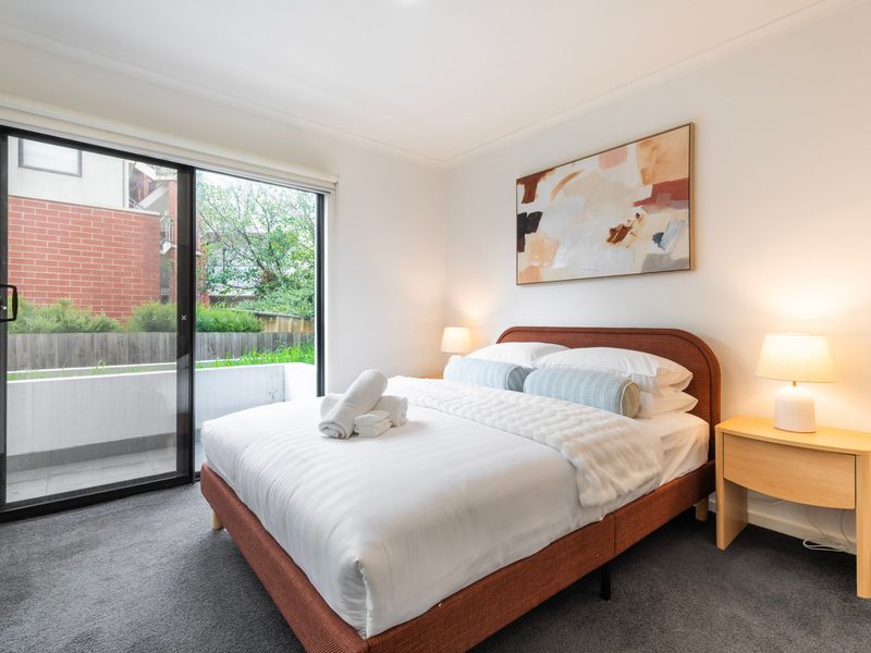 Peaceful bedroom with direct access to the balcony or courtyard