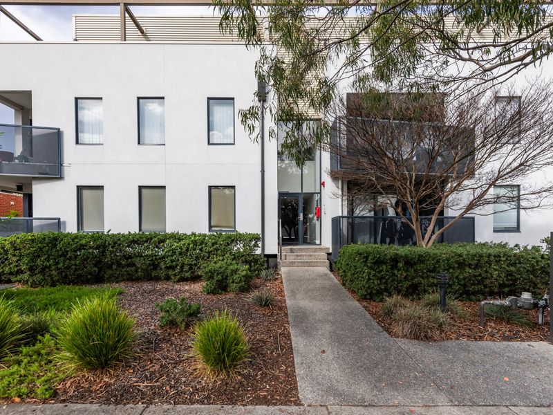 Well maintained apartment complex surrounded by established gardens