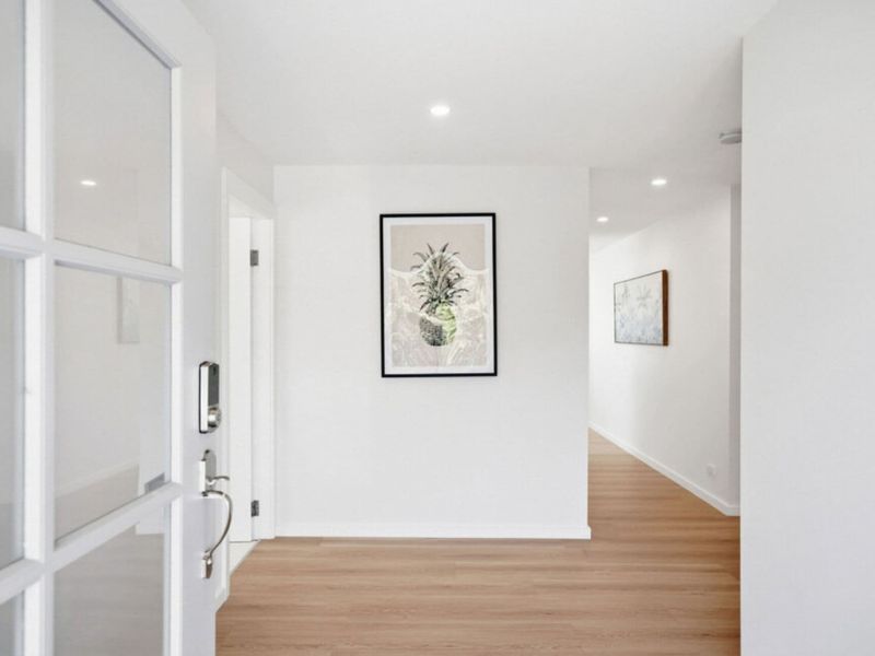 Welcoming entry hallway leading throughout the apartment.
