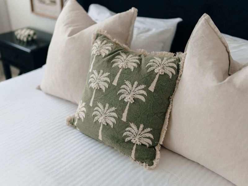 Coastal-inspired cushions add a relaxing beach house feel.
